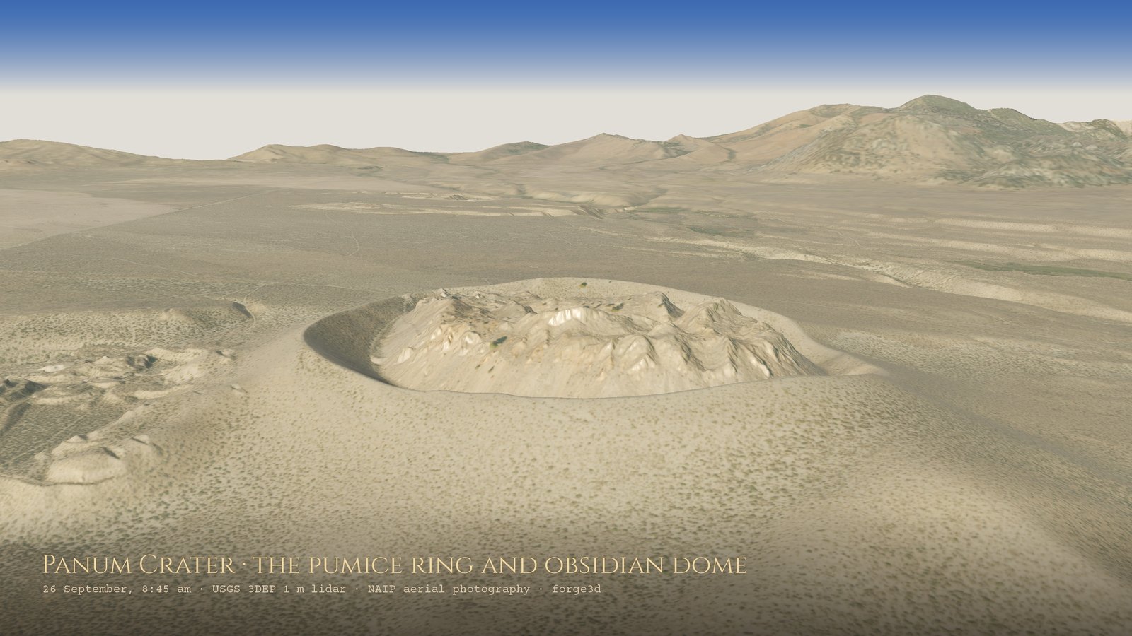A close aerial view of Panum Crater: a smooth, pale ring of pumice around a rough, jagged dome of obsidian and pumice in its centre, with sagebrush flats and the Bodie Hills beyond