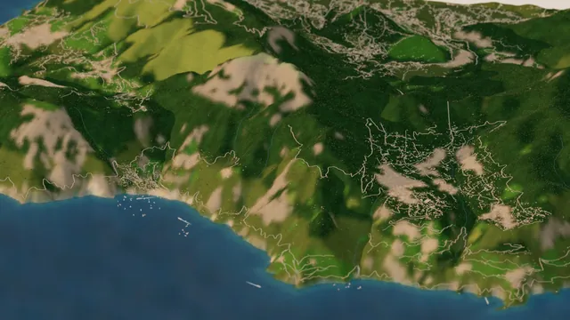 Looking up the miniature coast from above the sea toward Positano, Praiano and Furore in warm afternoon light, the coast road and the roads up to Agerola winding across steep green slopes, with Monte Sant'Angelo a Tre Pizzi above