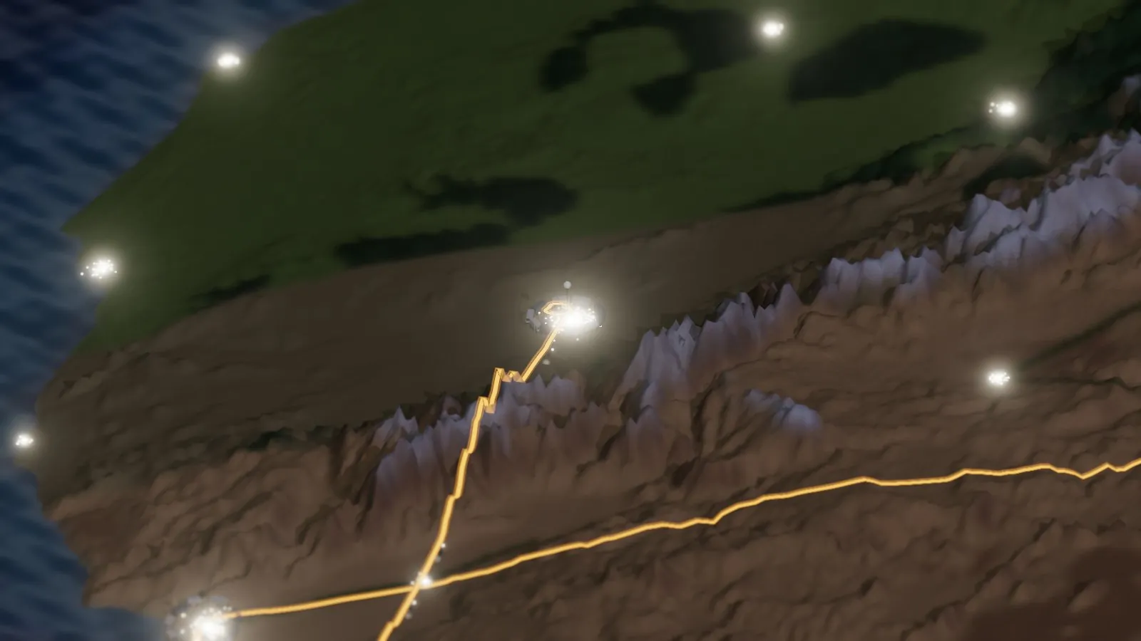The miniature Morocco at night: the dark Atlas with pale snow under moonlight, the glowing route, and the lights of Marrakech, the finish bivouac and the coastal cities