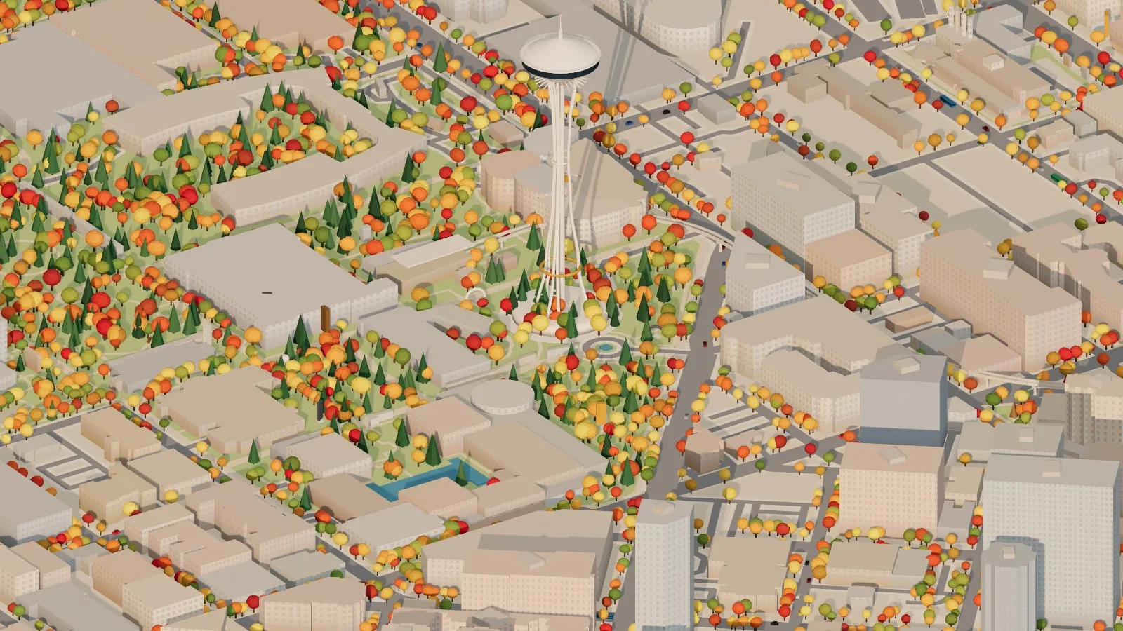 The Space Needle rising out of Seattle Center, surrounded by trees in orange, red, gold and green, with the Monorail beam curving past