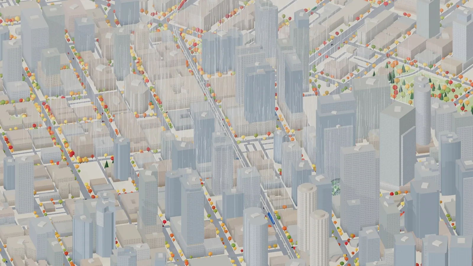 The miniature city in the rain, with grey sky, rain streaks falling between the buildings and darker, wet streets